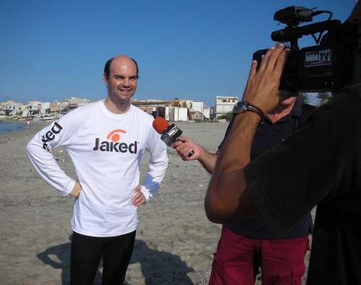 nuoto a delfino manette